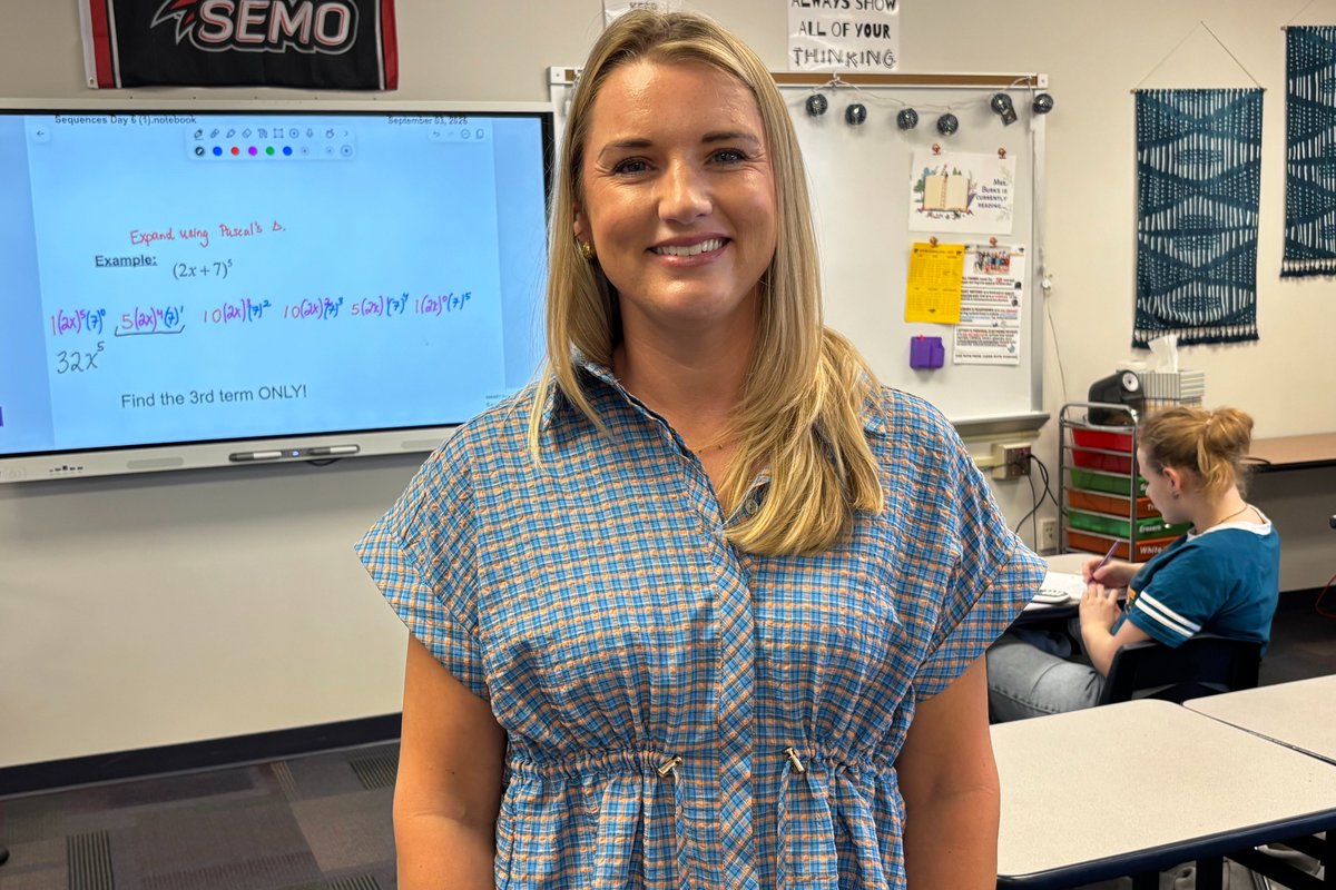 A Rockwood educator smiles in her classroom.