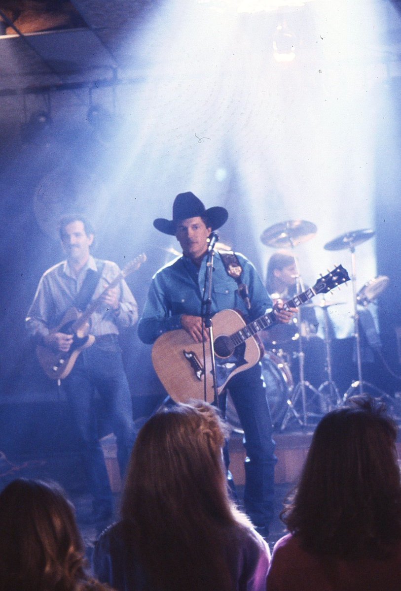 GeorgeStrait's tweet photo. A little look behind the scenes. Know which music video this shot is from? 🎬 #tbt https://t.co/bafHTPb6F9