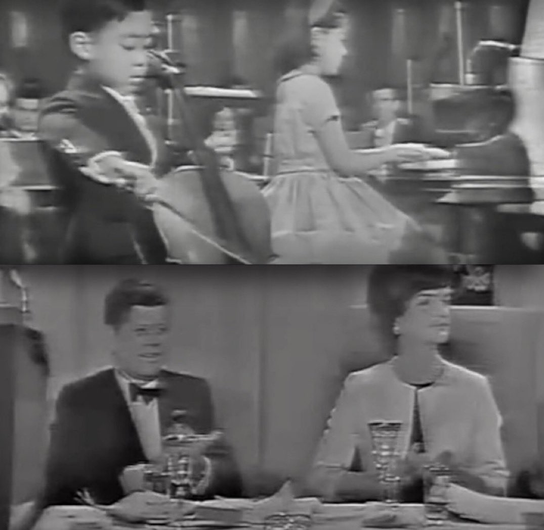 BeschlossDC's tweet photo. While 7-year-old Yo-Yo Ma performs, JFK and Jackie look on from head table of a 1962 fundraising dinner for what became, after his assassination, the John F. Kennedy Center for the Performing Arts: https://t.co/uTFSYvg1AI