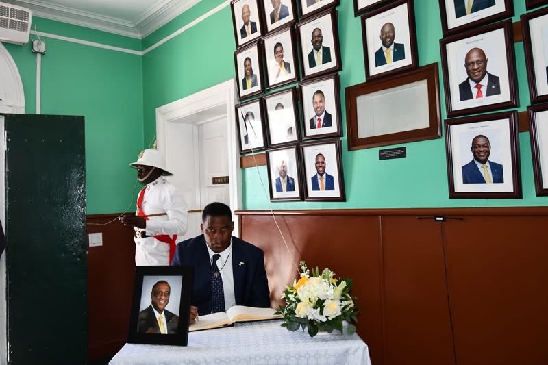 USEmbassyNassau's tweet photo. The United States Embassy extends its deepest condolences to the family, colleagues, and loved ones of the late Minister of Youth, Sports and Culture, The RT. Honorable. Neville Wisdom.

Ambassador Herschel Walker joined dignitaries at the House of Assembly to sign the official book of condolences, honoring Minister Wisdom’s service to The Bahamas.
 
The Embassy mourns his passing and recognizes his contributions to the nation’s youth, sports, and cultural community.
May his memory be a blessing to all who knew and loved him.