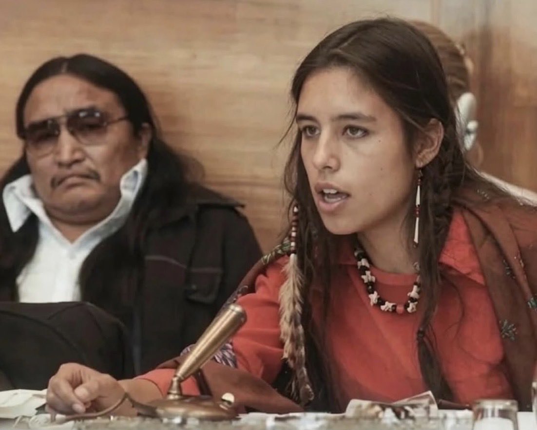 historyinmemes's tweet photo. “Why does wanting clean drinking water make you an activist, while poisoning it doesn't make a corporation a terrorist?”

- Winona LaDuke

Winona LaDuke, an Anishinaabe environmental activist, used these words to challenge a system that often shields corporate polluters while treating those who defend natural resources as criminals. Her message exposes the contradiction of labeling communities fighting for clean water and environmental protection as radical, while accepting the destruction of vital ecosystems as ordinary business.