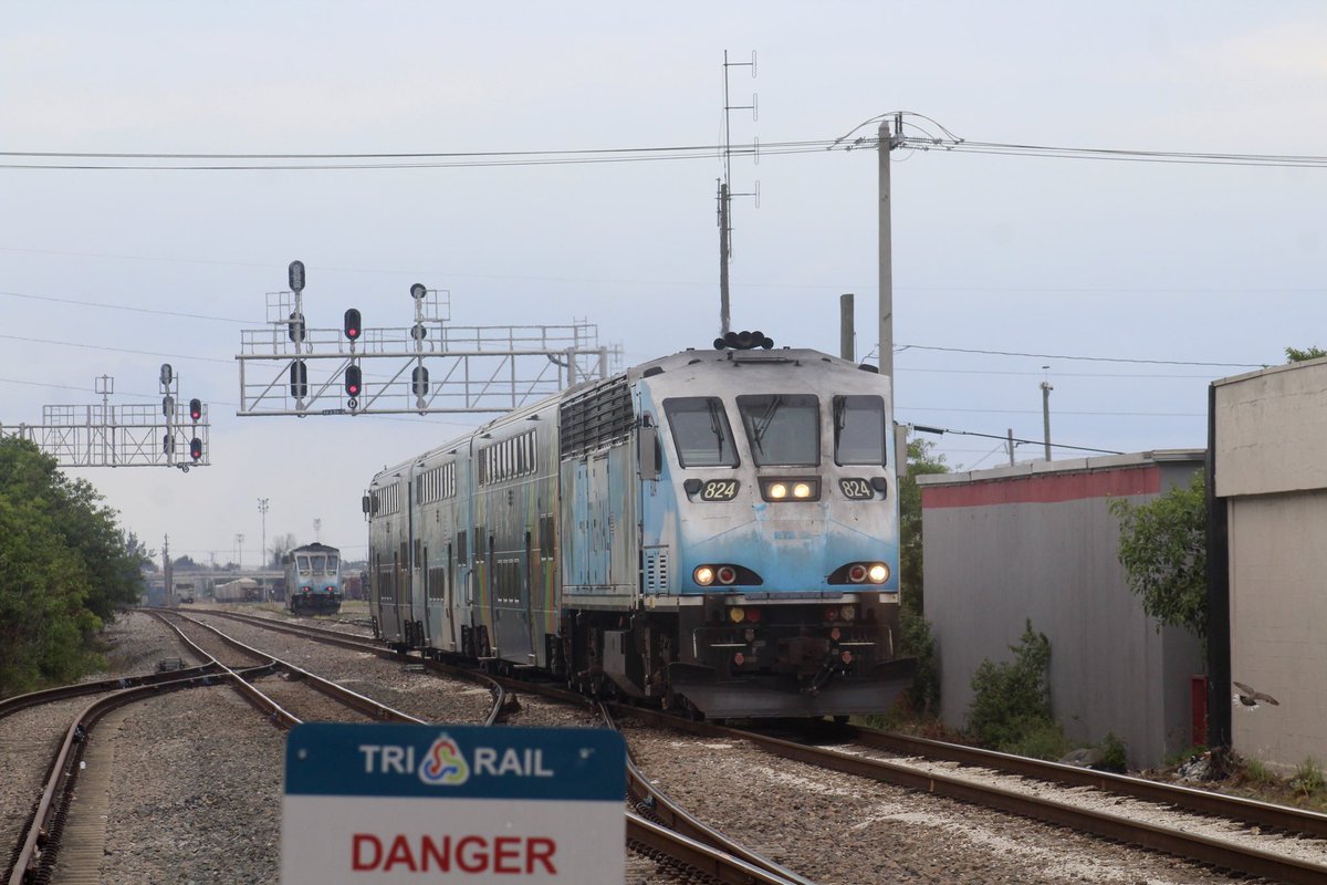 tommy4trains's tweet photo. Tri-Rail P30523 for Downtown Miami slips away from Hialeah Yard near Miami, Florida while P634X from Downtown holds clear inside the yard. My video of both of them and more: https://t.co/6cdbIYgh1f https://t.co/X3QyuydknM