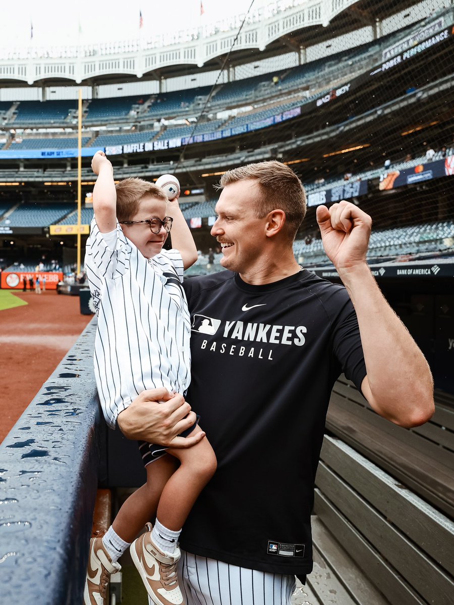 Brent Headrick hangs out with Henry in the Yankees dugout.