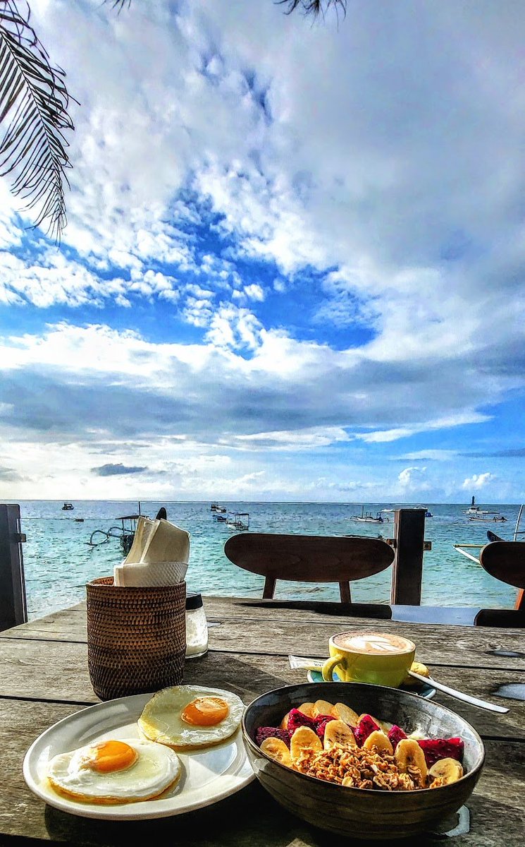 saranstm's tweet photo. Years ago, I spent two months traveling around Bali - one month exploring villages across the island and another month doing absolutely nothing but living by the beach.

My daily routine when I stayed put for that month:

45-minute morning walk on the beach
Group yoga by the beach - you just tip the yoga master
Breakfast - mostly healthy (pic)
$7 massage
Scooter ride around town
Lunch by the beach
One-hour gym workout
Healthy snacks
Another massage
A couple of drinks by the beach
Dinner
Night walk
Get a Gelato, sitting on the steps outside the shops, slowly eating it while people-watching
Back to the hotel and sleep

Repeat. Every. Single. Day.

Honestly, it was hard to call that a vacation. It felt like life had been put on pause.
