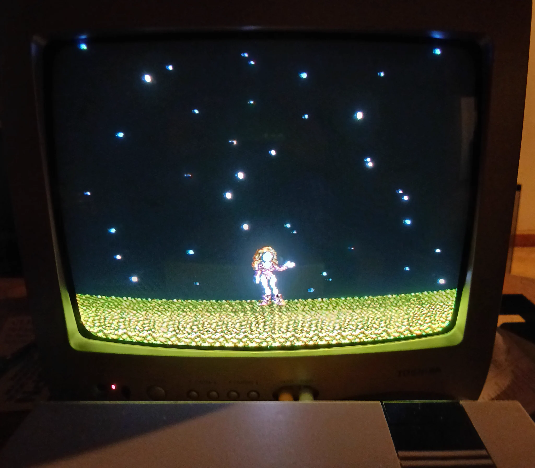 Metroid NES ending on original hardware and CRT. Samus wearing zero suit and waving.