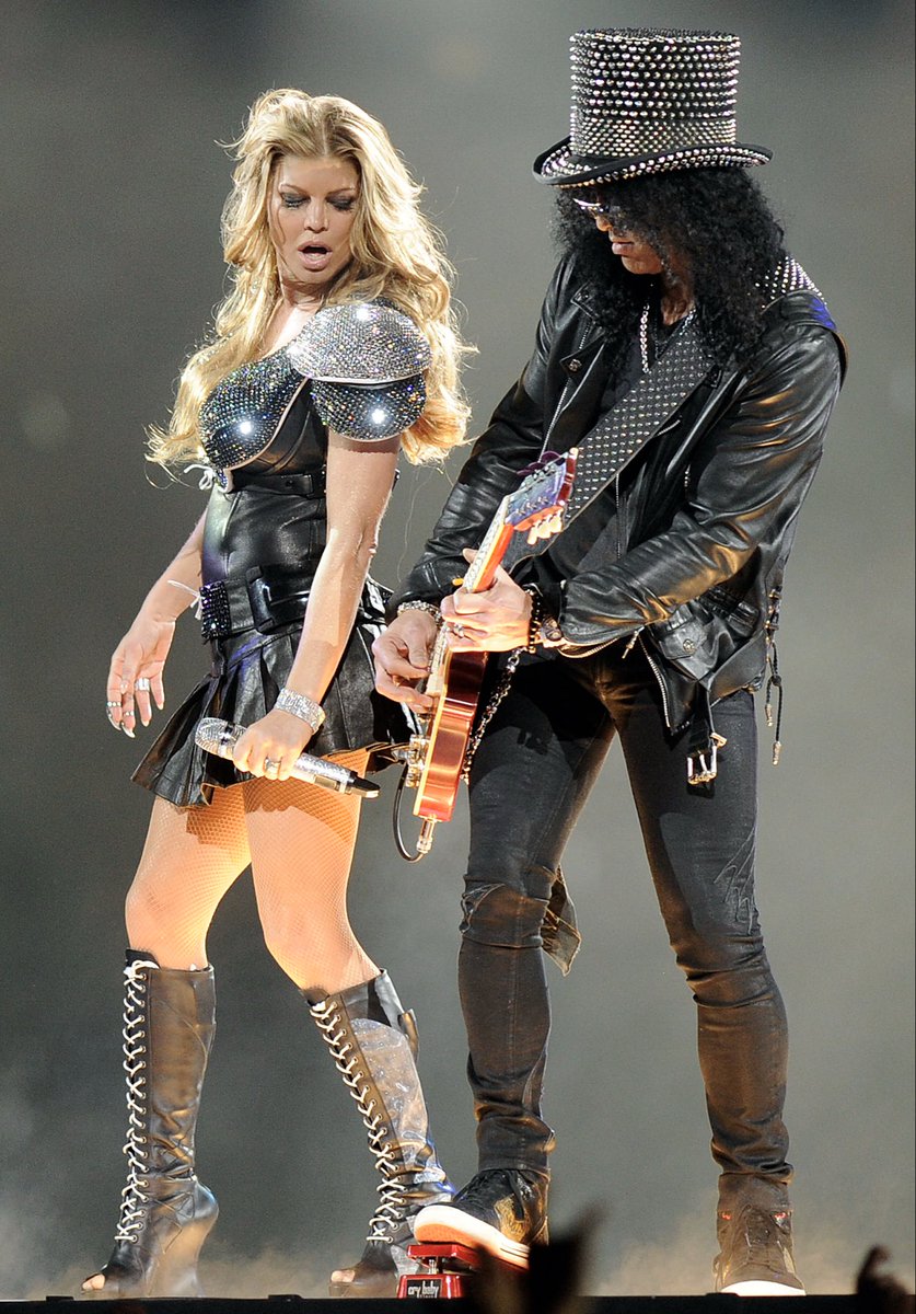 iheartfergie's tweet photo. who remembers this Fergie &amp; Slash moment?? Iconic https://t.co/p3hLmX8w5A