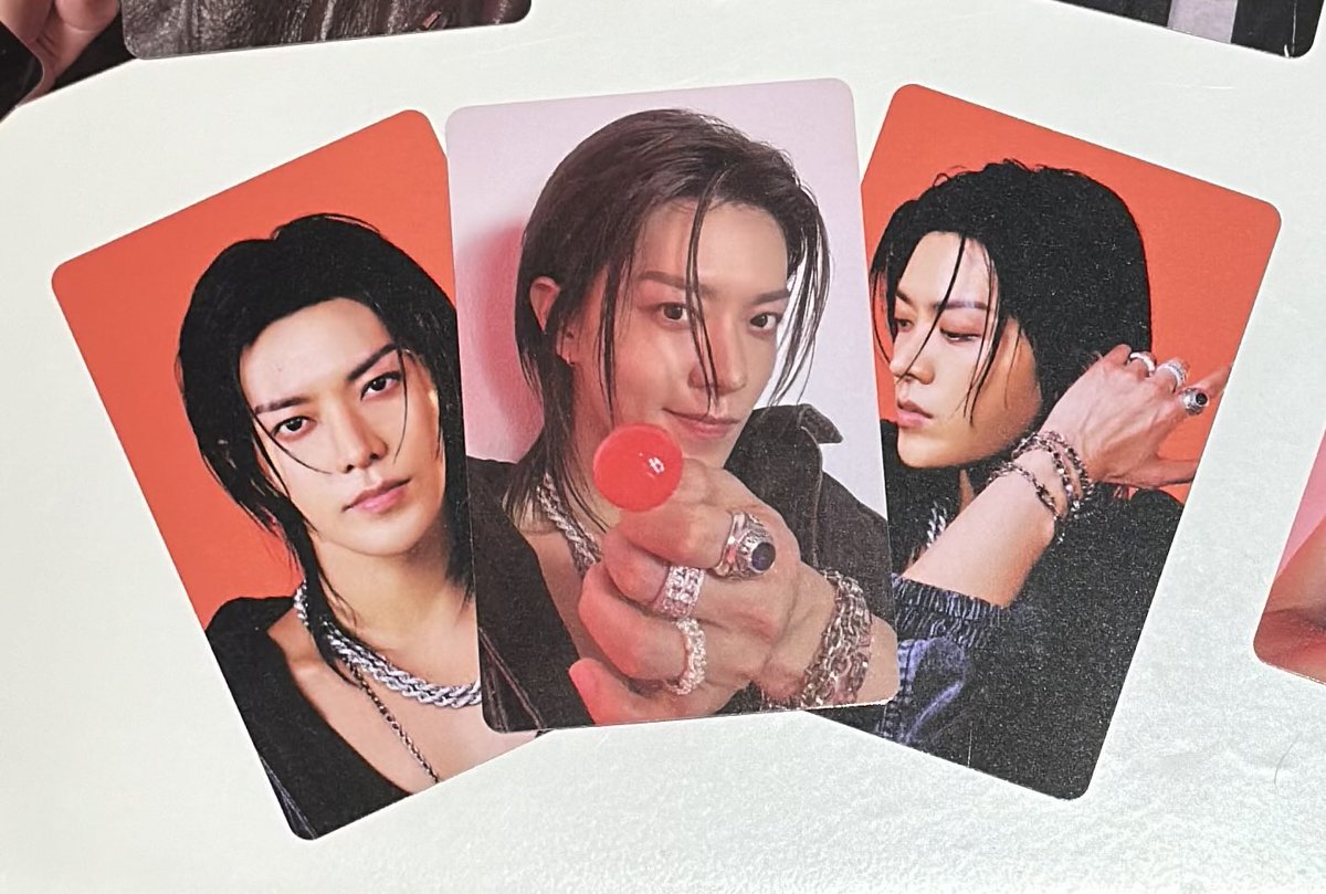 vintagevampyre's tweet photo. NCT 127 The Redline random trading card pulls. the YUTA lollipop photocard is so cute!💚🍒🦋 https://t.co/QB9OutqQN4