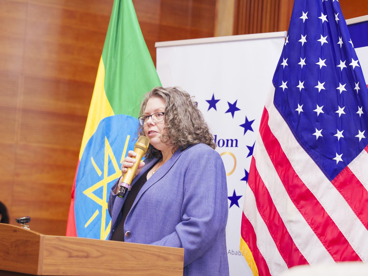 USEmbassyAddis's tweet photo. Ethiopia and the United States mean business. On September 15, the U.S. Embassy convened 120 Ethiopian alumni of U.S. exchange programs alongside @AmChamEthiopia, @EthioInvestment, and U.S. company leaders for Day One of the #Freedom250 Alumni Summit. The focus of the summit, “Connecting Alumni, Growing U.S. Business Partnerships,” signaled a direct push to empower exchange alumni as commercial bridges between Ethiopia and the United States.
State Department’s Assistant Secretary @ECA_AS headlined Day One with a video message affirming President Trump’s support for the efforts of the 6,000+ member alumni network to advance U.S.-Ethiopia commercial ties.
The opening panel didn't hold back. Habtamu Belay (Ethiopian Investment Commission), Bernadette Stewart (U.S. Commercial Service), and Berhane Demissie (AmCham Ethiopia) tackled the real barriers to U.S.-Ethiopia trade, with one panelist naming the "unpriceable" cost of policy unpredictability as the single biggest obstacle facing investors today. Wintana Kidane of the Ethiopian Securities Exchange added her voice to the day's keynotes.
Alumni also heard from KassahunMamo (Addis Ababa Chamber of Commerce), @SolomonMKassa, Omer Bomba Mohammed, and Theo Theoharis, with Dr. Walter McCollum facilitating the day's discussions on positioning alumni as trusted advisors to U.S. companies.
Opening the Summit, Acting Deputy Chief of Mission Adrienne Nutzman put it plainly: "Our exchange alumni are more than program graduates. You are leaders, entrepreneurs, and trusted voices who understand both the Ethiopian market and the United States. And you are uniquely positioned to connect the two."  @USalumnieth @StateIVLP 
#Freedom250 #USinEthiopia #ExchangeAlumni #Fulbright #MandelaWashingtonFellowship #IVLP #HumphreyAlumni