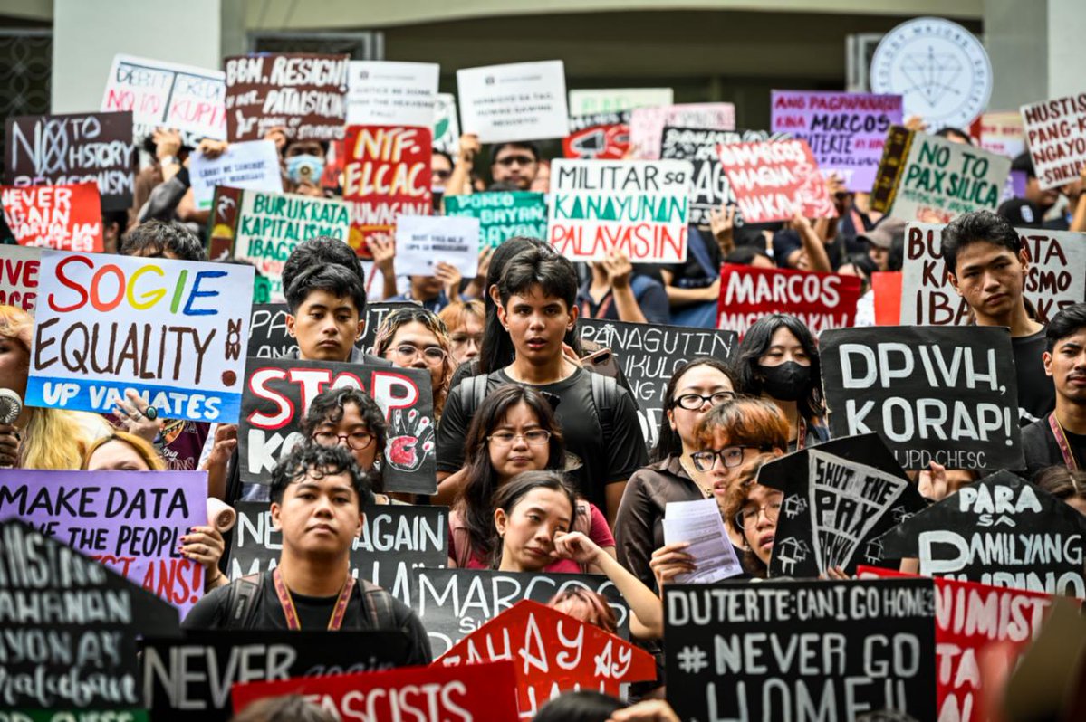 ABSCBNNews's tweet photo. Students, teachers, and education workers hold a Black Friday protest under the call “Walang Makalilimot! Iskolar ng Bayan, Walkout Na!” at the University of the Philippines Diliman in Quezon City on Friday, September 18, 2026.

They demand accountability over corruption and impunity and call for increased government funding for education. | via Maria Tan, ABS-CBN News