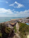 CastlesBritain's tweet photo. Hastings Castle felt painfully thin for nearly £7

I just paid £6.95 to enter Hastings Castle in East Sussex, and came away wishing I’d stopped at the free history boards before the gate. The castle is still mostly ruins, with an adult ticket currently costing £6.95. 

I genuinely love a ruin. I don’t need dressed rooms or actors wandering about in armour (give me an old doorway and I’m happy). But once inside, I kept looking for the story that would make these stones feel inhabited.

There are walls, a dungeon, information boards and the hilltop view across Hastings, yet the experience felt remarkably slight for a paid attraction. The most galling part was finding that some of the broader history could already be read before paying. 

Even the West Hill Lift journey up felt more memorable than the castle visit itself.

Hastings is now planning a new visitor centre as part of wider improvements to the site, which frankly makes sense. 

For now, I’d enjoy the hill and the view and think carefully before buying the castle ticket. Hope your next castle day gives you rather more for your money.