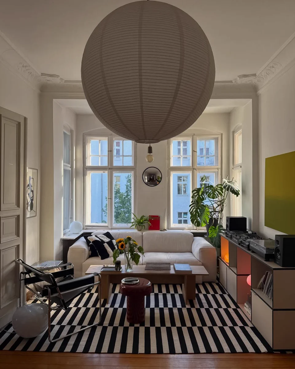 Interior Only on X: "Bright eclectic living room with bold striped ...