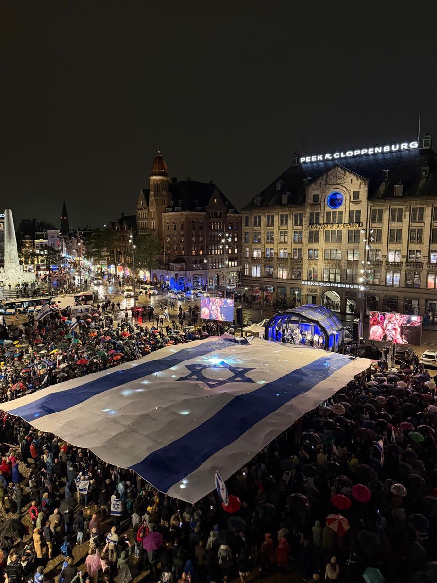 vapni's tweet photo. Despite the rain and wind, our amazing Christian friends didn't back down—they rolled out our flag in Dam Square in Amsterdam yesterday. 

We thank them for their support and salute their unwavering commitment! https://t.co/0gjDAFlhLM