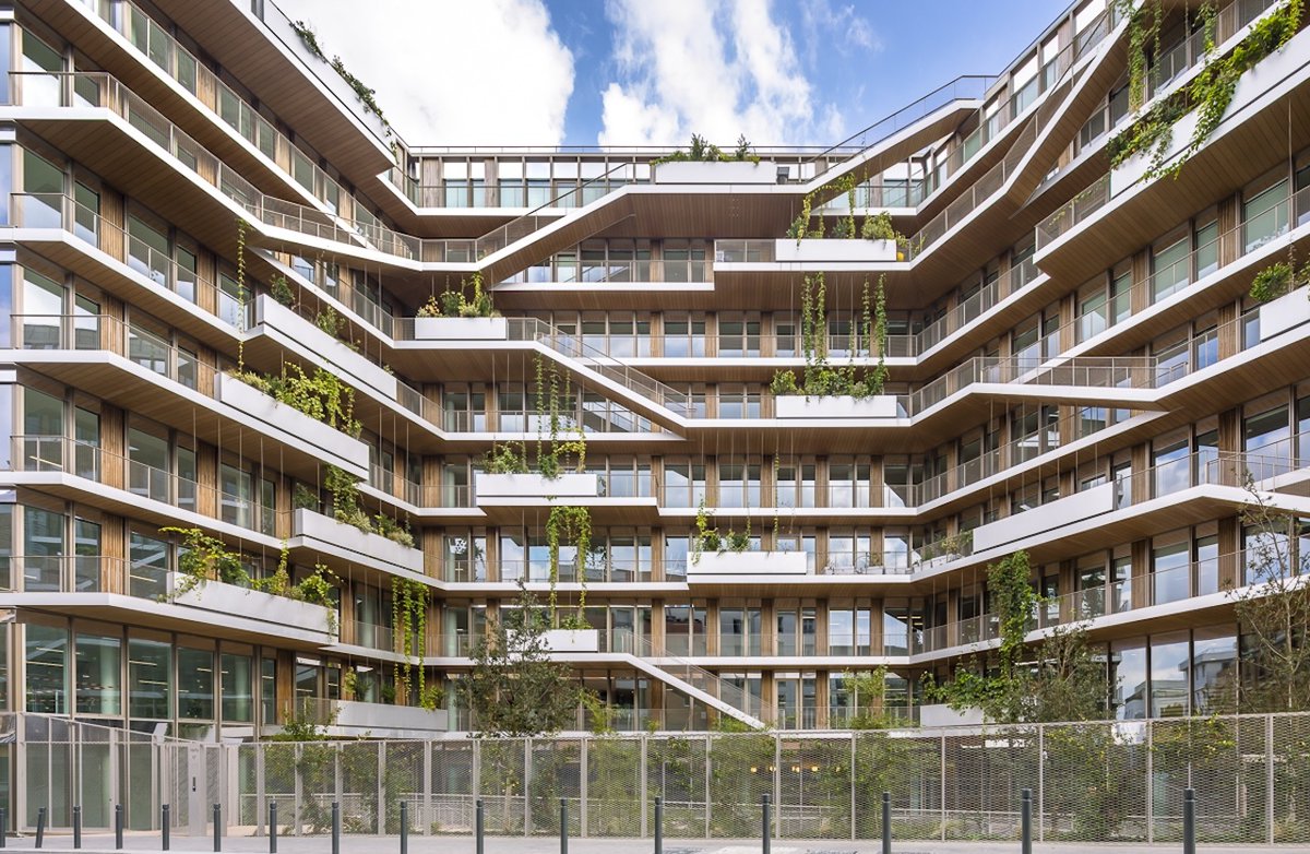 Architizer's tweet photo. #ProjectOfTheDay: REIWA by Brenac & Gonzalez & Associés
Reiwa brings a new 25,000-square-metre office building to the changing district between Saint-Ouen’s town hall and the Paris ring road. Its architecture shifts between a modular crystalline façade and deeply planted terraces, with outdoor stairways connecting workspaces through a sequence of elevated gardens.
📍Saint-Ouen-sur-Seine, France
Details: https://t.co/JcqSfUo8l8