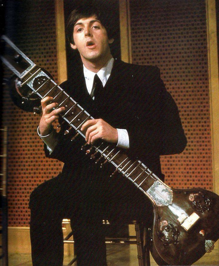 BeatlesEarth's tweet photo. Paul McCartney playing the sitar, 1965 https://t.co/gFqryIxbmj