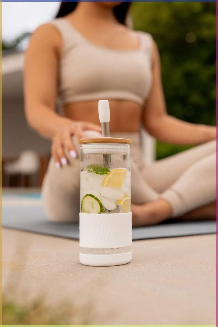 _Biy_a_'s tweet photo. Freshness in every sip
Hydrate, refresh, repeat
Your perfect daily reset

8-second video prompt:👇

Create an 8-second realistic lifestyle product video using the provided image. Keep the same woman, glass, bottle, lemon and cucumber slices, and overall setting. Start with a slow cinematic push-in toward the bottle. At 2 seconds, the woman gently reaches forward and picks up the bottle. From 3–6 seconds, she brings it toward herself and takes a refreshing sip through the straw. Show the lemon and cucumber slices moving naturally inside the water. End with a smooth close-up of the bottle and a fresh, refreshing feel. Soft natural daylight, shallow depth of field, realistic hand movement, subtle camera motion, clean aesthetic high-quality commercial style