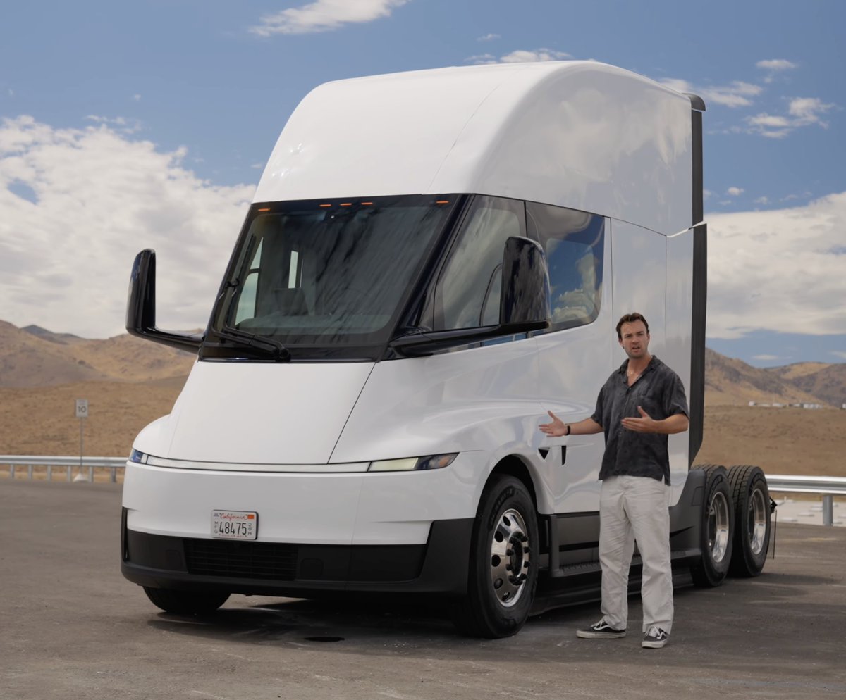 SawyerMerritt's tweet photo. Top Gear has released a new video of the production version @Tesla Semi. We get our first look at the full production line.

New info:
• The Tesla Semi isn't painted, it's powder coated, like Megapacks are. There is no paint shop.
• Production version is 3% more efficient than prototype
• More aerodynamic than a Bugatti Chiron
• Standard Range has a 548 kWh battery
• Tesla Semi is only 7x less efficient than a Model Y
• Fitted a new air vent in the front bumper for better efficiency
• Production Semi has a three piece front bumper for easier repairing
• Seats are heated and cooled, despite being cloth seats
• The squarer battery holds heat better, meaning better cold weather efficiency
• A 6 foot 6 adult can stand up straight in the cabin without hitting their head
• The biggest sun visor I've ever seen

I definitely recommend watching the full video here: https://t.co/KTUivzsc30