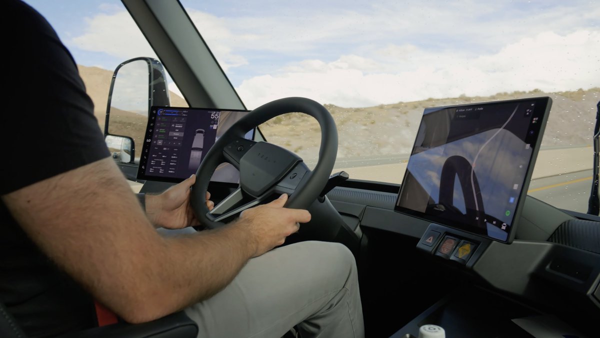 SawyerMerritt's tweet photo. Top Gear has released a new video of the production version @Tesla Semi. We get our first look at the full production line.

New info:
• The Tesla Semi isn't painted, it's powder coated, like Megapacks are. There is no paint shop.
• Production version is 3% more efficient than prototype
• More aerodynamic than a Bugatti Chiron
• Standard Range has a 548 kWh battery
• Tesla Semi is only 7x less efficient than a Model Y
• Fitted a new air vent in the front bumper for better efficiency
• Production Semi has a three piece front bumper for easier repairing
• Seats are heated and cooled, despite being cloth seats
• The squarer battery holds heat better, meaning better cold weather efficiency
• A 6 foot 6 adult can stand up straight in the cabin without hitting their head
• The biggest sun visor I've ever seen

I definitely recommend watching the full video here: https://t.co/KTUivzsc30