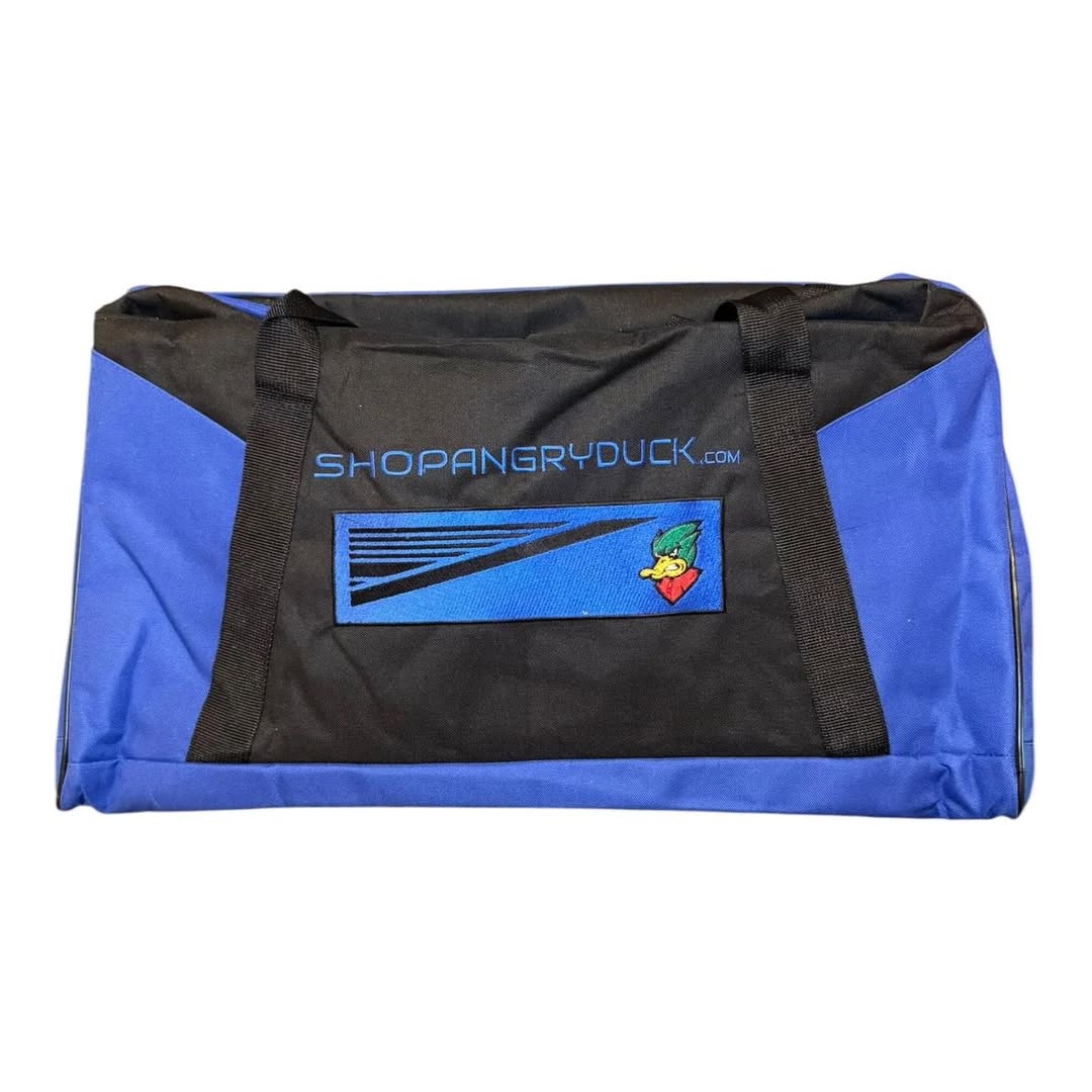 CapaaGomez's tweet photo. Angry Duck Gear Bags are in stock! Built for the track, gym, game day, or weekend trips. Large main compartment, front zip pocket, heavy-duty straps, and durable construction. Available in multiple colors. Which one are you picking? https://t.co/i46LsnTX0Y