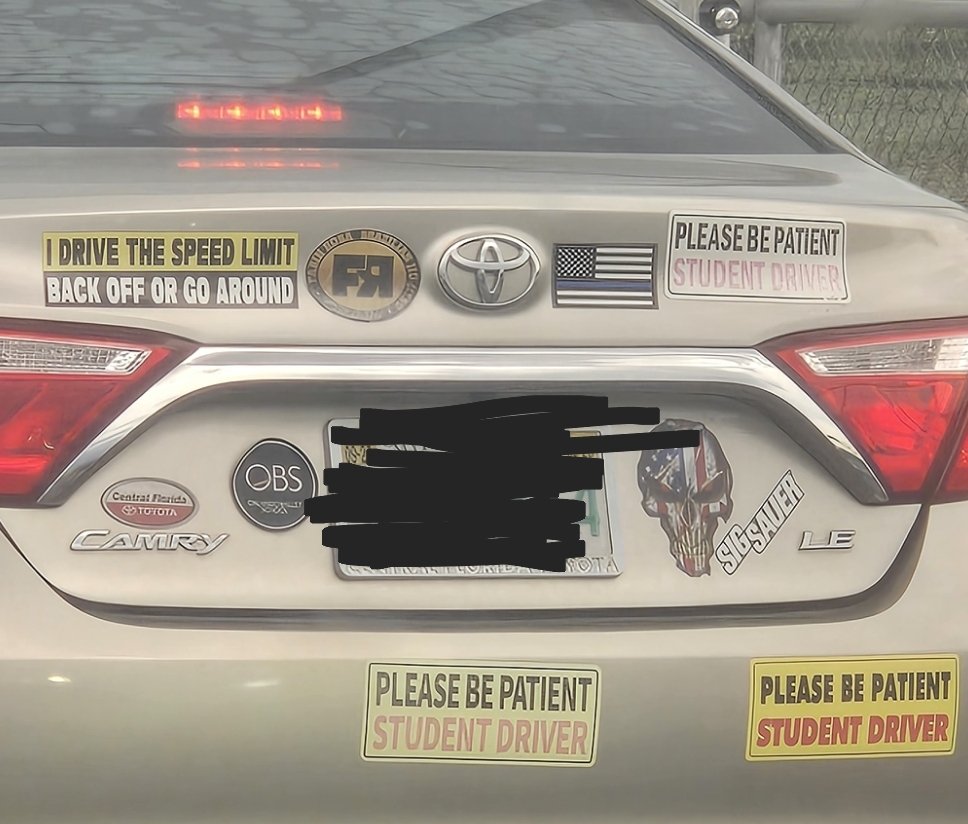 LokiFurr's tweet photo. Dude has not 1, not 2, but 3 student driver stickers 😭😭 one is faded asf too so I know his ass lying https://t.co/YiSjXAXBvz