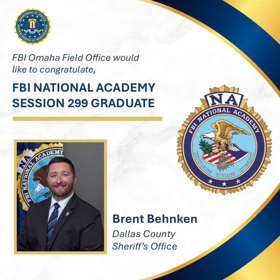 Portrait of Brent Behnken in a suit, congratulated as FBI National Academy Session 299 graduate by FBI Omaha Field Office.