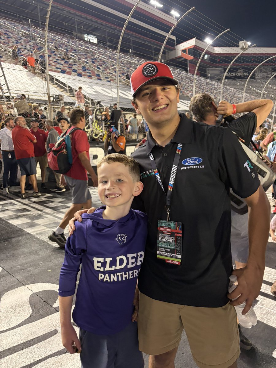 CoachBengel's tweet photo. Happy Purple Friday with future Elder grad Scotty, 2037, and Jackson Macenko, 2022, at Bristol Motor Speedway! #Altiora https://t.co/k43JMRpnoU