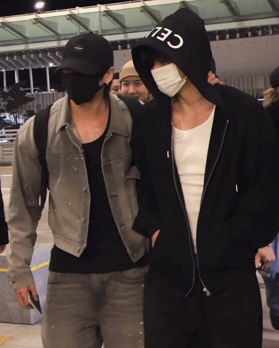 _imalittleshy_'s tweet photo. #taekookau where rival hockey players Taehyung &amp; Jungkook arrive at the airport in the same car, Jungkook’s hand glued to Taehyung’s nape, heavy tension in the air ever since Taehyung’s teammate kissed his forehead during yesterday’s game. https://t.co/TkVlO0HVN0