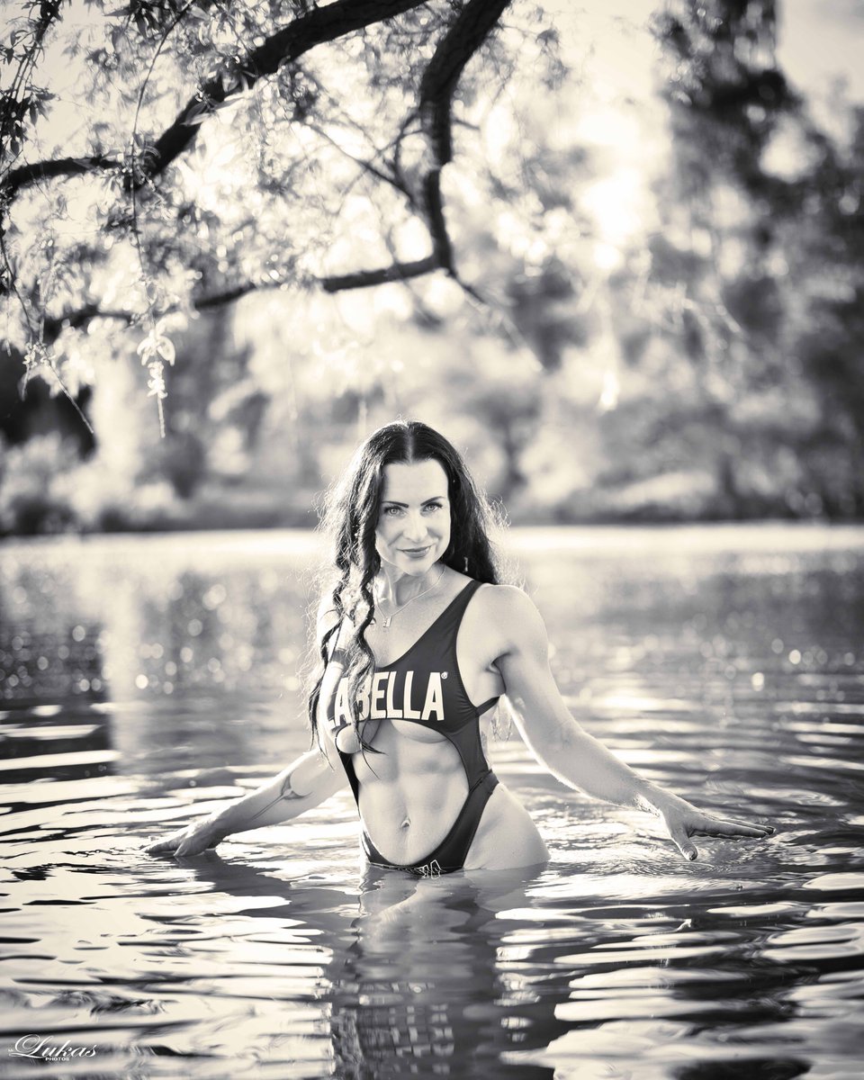 averyroberts6dv's tweet photo. A maiden embraced by the water quietly reflects beneath a canopy of secretive branches. Her fingers brush the cool surface as golden light washes away her guilt. The misty forest fades into the distance, and the mystical moment returns to her soul. https://t.co/jyN9L5UnSg