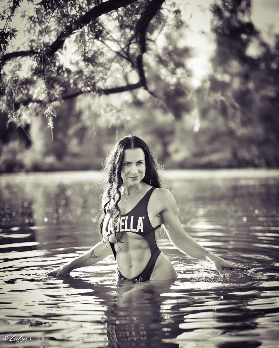 averyroberts6dv's tweet photo. A maiden embraced by the water quietly reflects beneath a canopy of secretive branches. Her fingers brush the cool surface as golden light washes away her guilt. The misty forest fades into the distance, and the mystical moment returns to her soul. https://t.co/jyN9L5UnSg