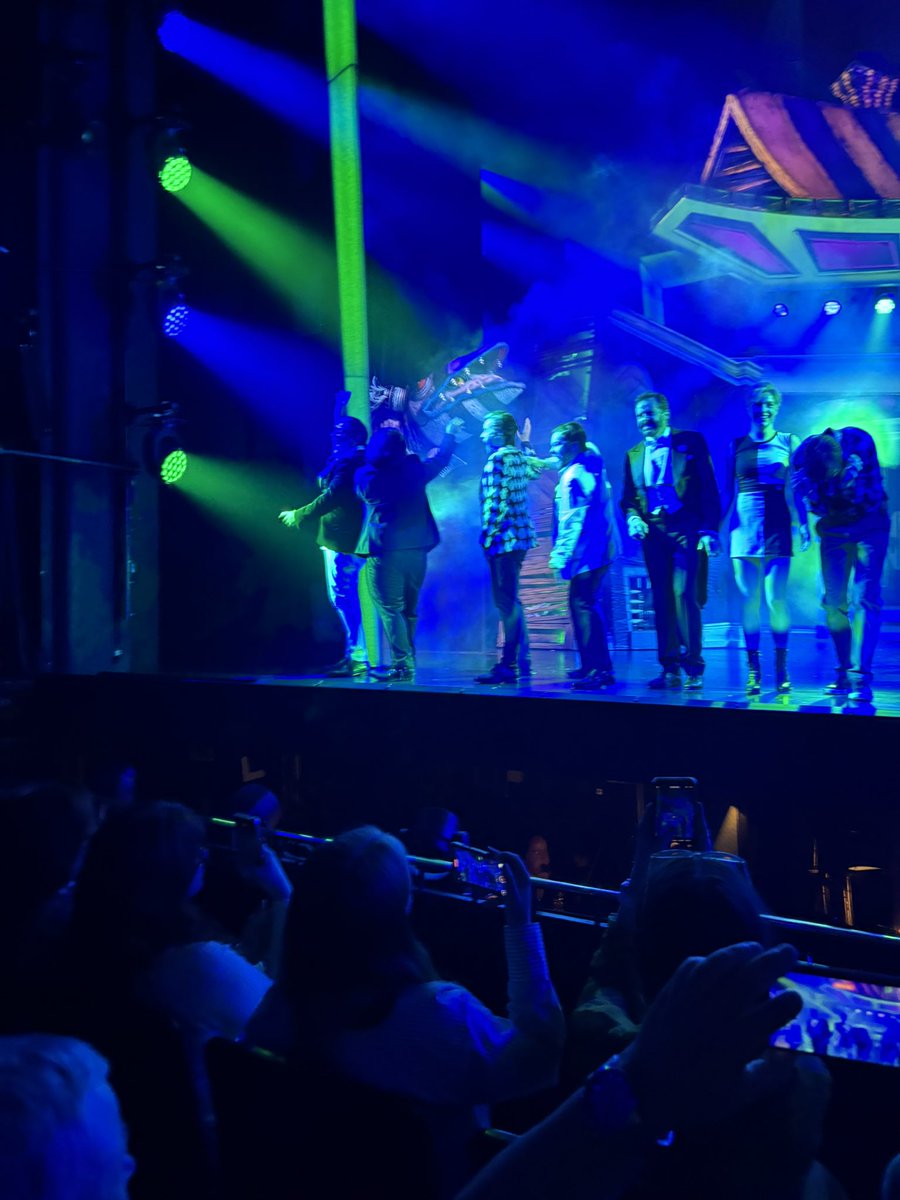 Lisa_Marie_68's tweet photo. Me, sister and the kids went to see Beetlejuice on stage.
The sand worm was a little too quick for me to fully capture at the end.
If you need a laugh go and watch it 🪲🧃 
The audience wore some amazing costumes too. https://t.co/1BWkX2osB9