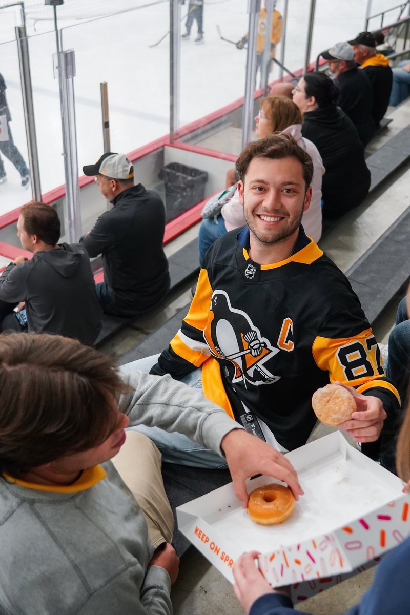 Photo of fans with donuts.