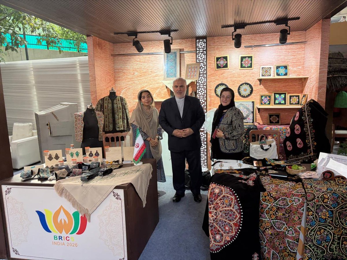 Iran_in_India's tweet photo. Dr. Mohammad Fathali, Ambassador of the Islamic Republic of Iran to India, visited the BRICS Bazaar in New Delhi, where he met and held discussions with two Iranian artists working in the field of handicrafts who were participating in the event. https://t.co/FHb6G19H0H