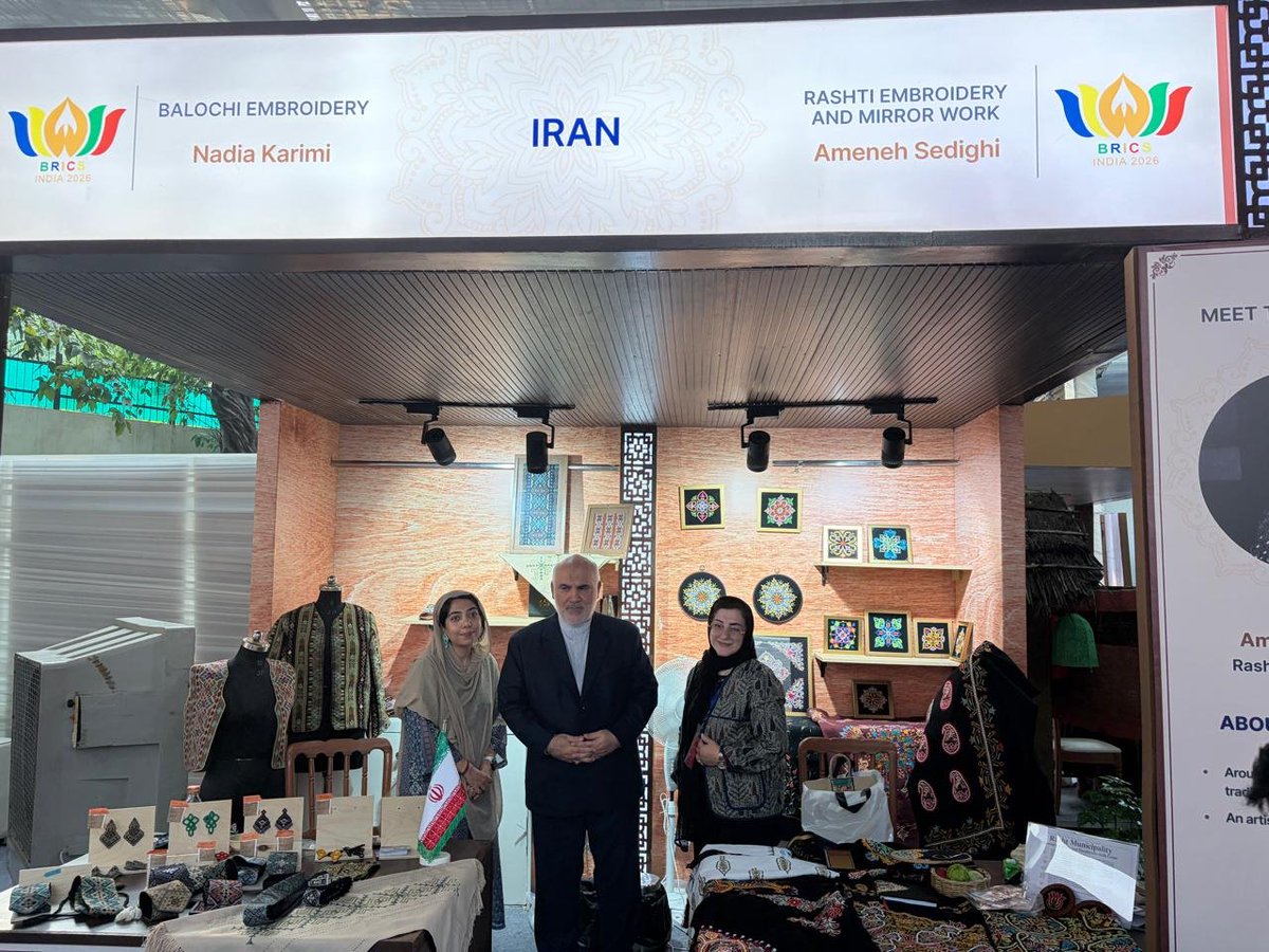 Iran_in_India's tweet photo. Dr. Mohammad Fathali, Ambassador of the Islamic Republic of Iran to India, visited the BRICS Bazaar in New Delhi, where he met and held discussions with two Iranian artists working in the field of handicrafts who were participating in the event. https://t.co/FHb6G19H0H
