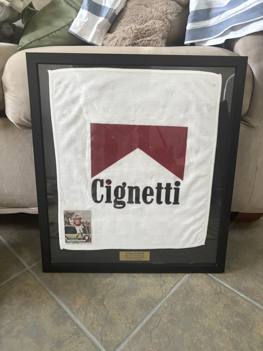 Zachb237's tweet photo. @thehollandmarch This is sick. I framed this for my dad after the B1G championship but I clearly got framemogged https://t.co/YnLsZ0elS6