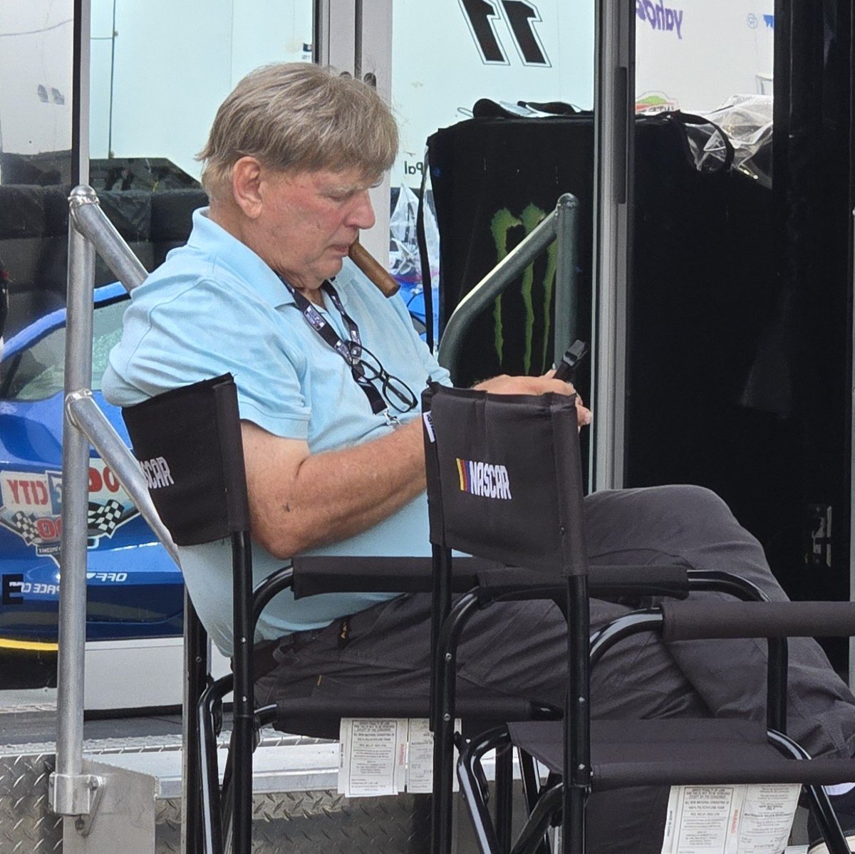STaranto92's tweet photo. Jimmy Spencer is in Bristol and he's hanging out by the NASCAR hauler. Cigar and all. https://t.co/55w4CLfyUY
