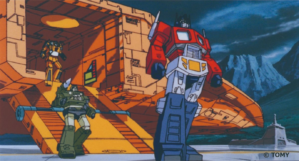 TF_specialevent's tweet photo. 『戦え！超ロボット生命体トランスフォーマー』の吹き替えを手掛けたのは、『ビバリーヒルズ高校白書』の音響監督・田島莊三氏と、『コマンドー』で知られる翻訳・平田勝茂氏。粋なセリフの応酬もシリーズの大きな魅力です。
    
今回の『ザ・ムービー』も、おふたりが1989年に制作した日本語音声を使用。40年越しのスクリーンで、その妙をお楽しみください！
 
40年越しのスクリーン上映で、日本語吹き替えならではの妙味をぜひお楽しみください。
 
チケット購入はこちら
https://t.co/coVR5E3yfj
#トランスフォーマーザ・ムービー
#40周年
#日本初劇場上映
#宇宙をひとつに