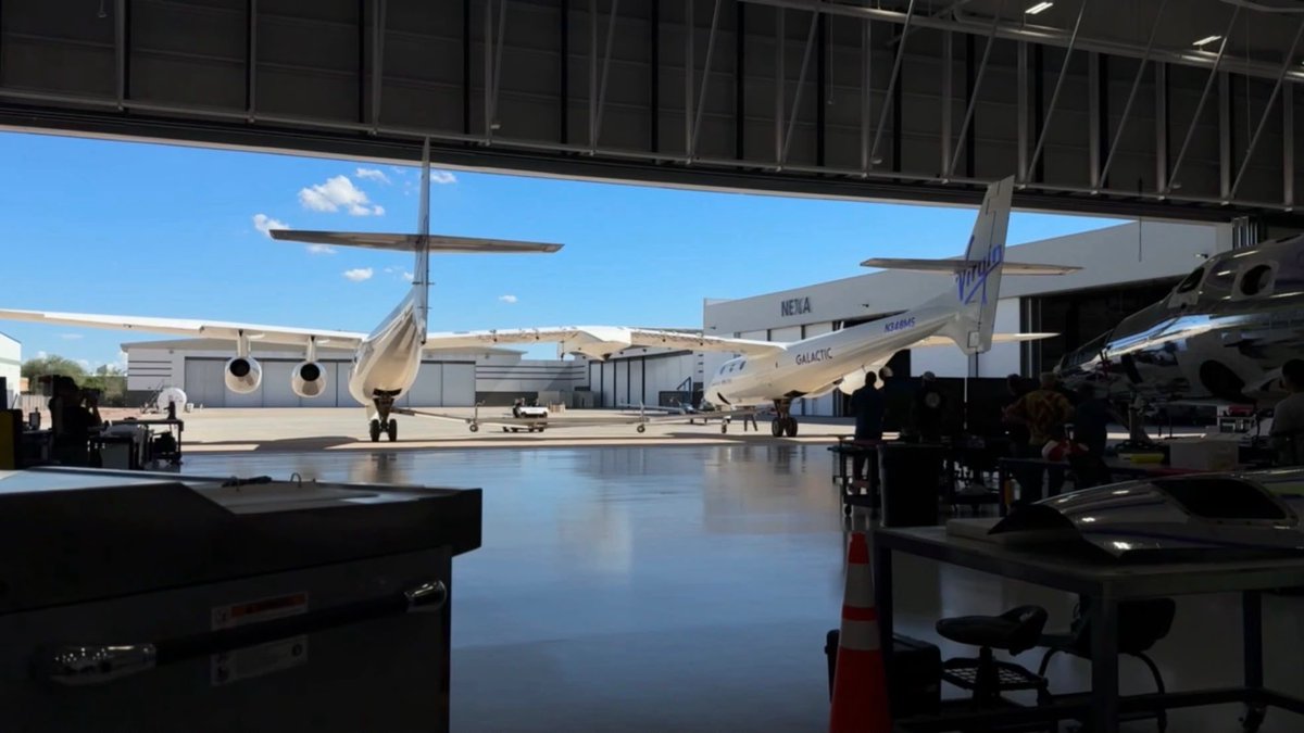 virgingalactic's tweet photo. Busy week for Eve.

Wednesday: carried Unity to 53,000 ft for a glide flight.

Today: Flew to Mesa, AZ for integration checks with our new spaceship. https://t.co/ynrzEVBSSN