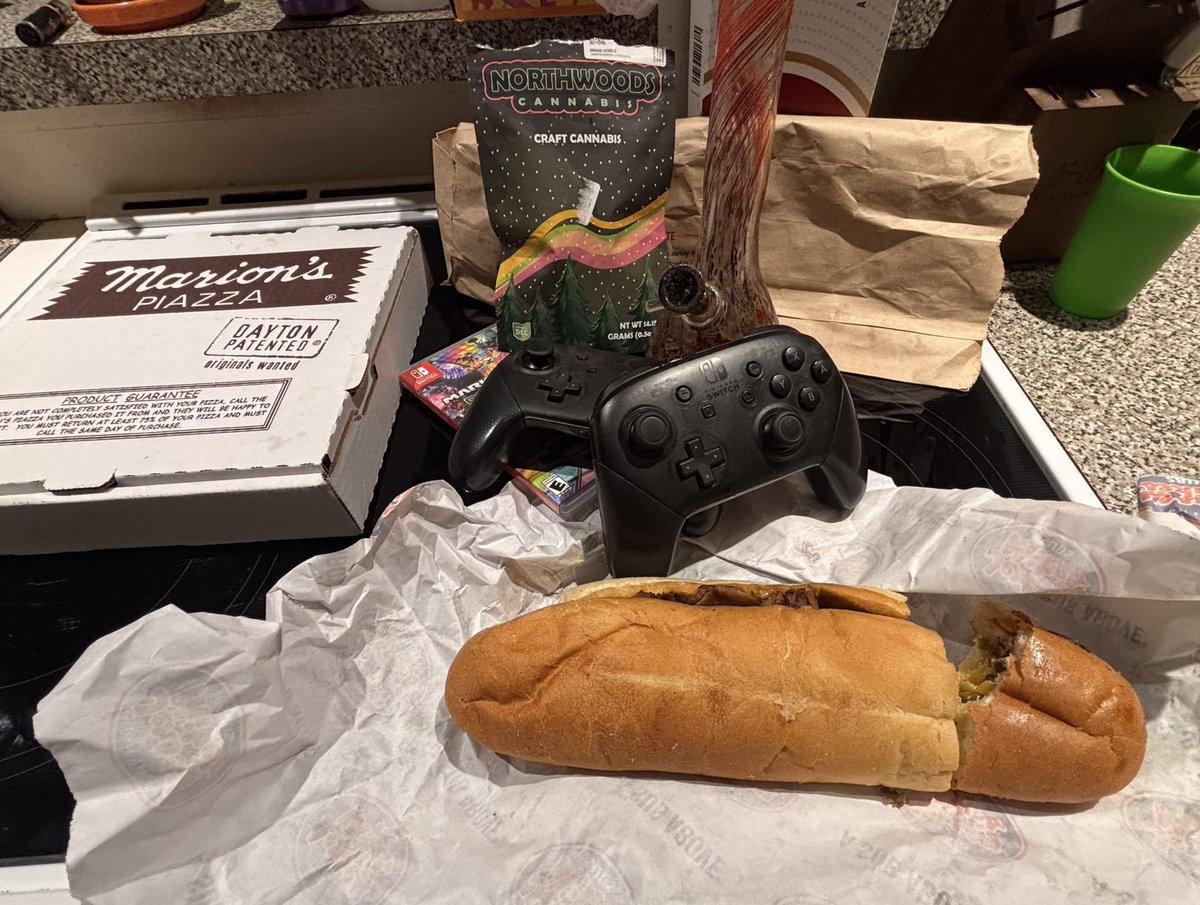 FabQuilp's tweet photo. We got Mario Kart 8, a box of Marion’s, plenty of goodies, two controllers… it’s late, and neither one of us is wearing sunglasses.
    Hit it. @gooftroop2025 😎🍕🏁

#goodfriends #nintendo #420 https://t.co/bODpqIkR8P