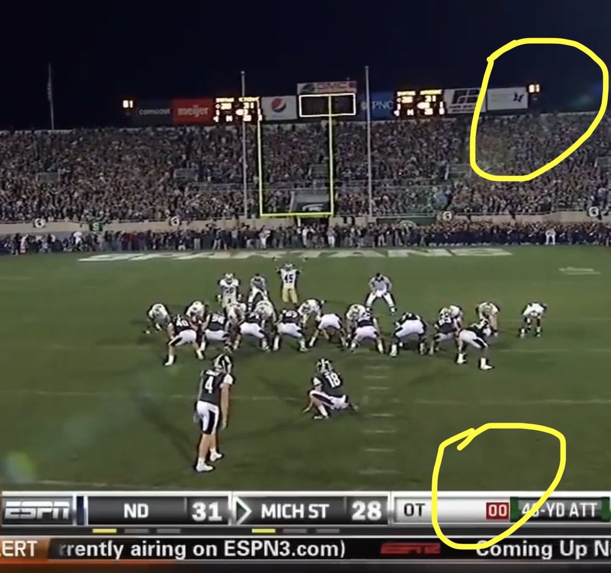 ChadFisher's tweet photo. Michigan State should not have won this game. TV play clock shows zero and stadium clock is at 1 second. 

I expect MSU fans to no longer claim they won this game. https://t.co/hpavGupQwT