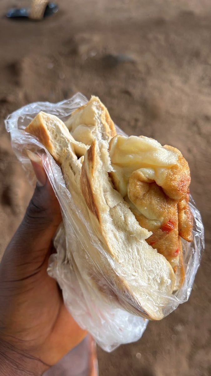 Whezdomm's tweet photo. Man shall not leave by bread alone, na why I add small egg by the side https://t.co/Iwg3ZGCH69