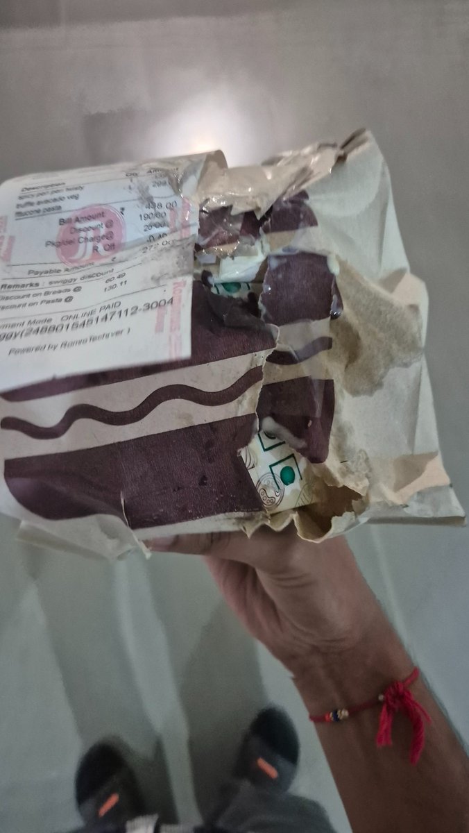 HarshitGupta07's tweet photo. @SwiggyCares Entire order torn apart delivered with spillage of the entire order. What is wrong?! https://t.co/pfwotTklct