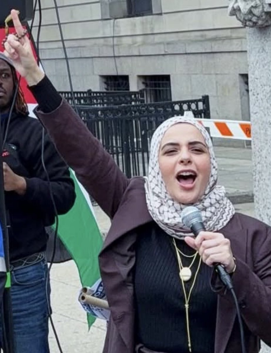 NizNellie3's tweet photo. 🚨  Apparently, exposing and humiliating DHS is the only tactic we have left, so here we go:

As you watch the video of this howling banshee, keep in mind, this is someone who has overstayed her student visa by 4 years.

She is an illegal alien.

Leqaa Kordia is a fake “student” from the West Bank who arrived on a student visa in 2016.

She was supposed to return in 2022, but never did.

Kordia is a Palestinian terror-supporter who refers to herself as a “political prisoner in America.”

She’s been here on our dime for 10 years.

Our taxes paid for her housing, her food, and her fake school attendance.

There is no evidence she ever attended college, other than a few weeks in a language course.

She became an unhinged protestor during the riots at Columbia University, despite not being a student.

Kordia was seen screaming her brains out for the destruction of America and Israel, while waving the Palestinian flag like a lunatic.

ICE arrested her one year ago. One of Biden’s commie judges released her.

Upon her release, she began screeching, “FREE PALESTINE” and led a chant in Arabic for Allah.

She now gives interviews as an activist against ICE. 

Naturally, in every interview, she trashes America and Israel.

The Republican party is stumbling around wondering why 77 million voters are pissed off at them?

THIS. THIS IS A HUGE WHY.

Our window to remove criminal foreigners who promote terrorism will not remain open indefinitely.

@FBI
@DHSgov 
@POTUS