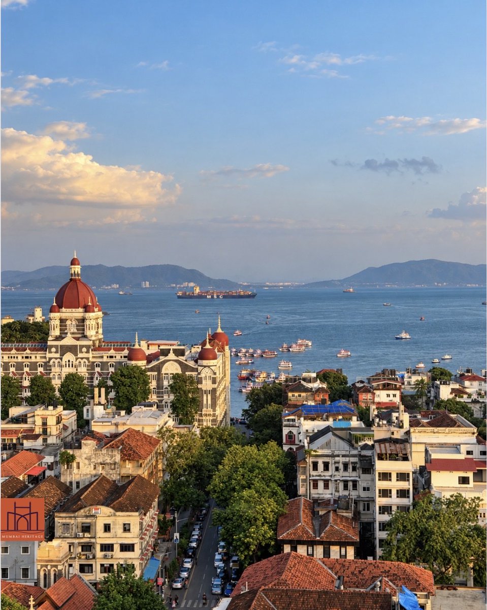 mumbaiheritage's tweet photo. Good evening from Mumbai. 
For a moment, this almost feels like Italy.
But those terracotta rooftops, the harbour and the Taj remind you… this is Mumbai. https://t.co/tDlnTIp04K