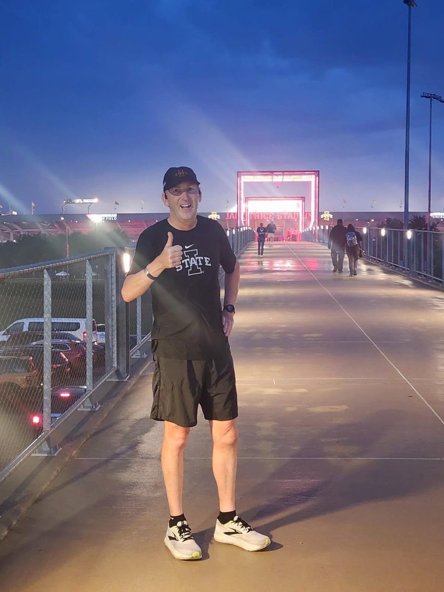 IASTATEAD's tweet photo. A little thunder and rain was not going to cancel the game day tradition of a morning run over the bridge.  Thanks to Jason Runyan from Ames for agreeing to take my picture. Go Cyclones! https://t.co/vghux9t7Pp