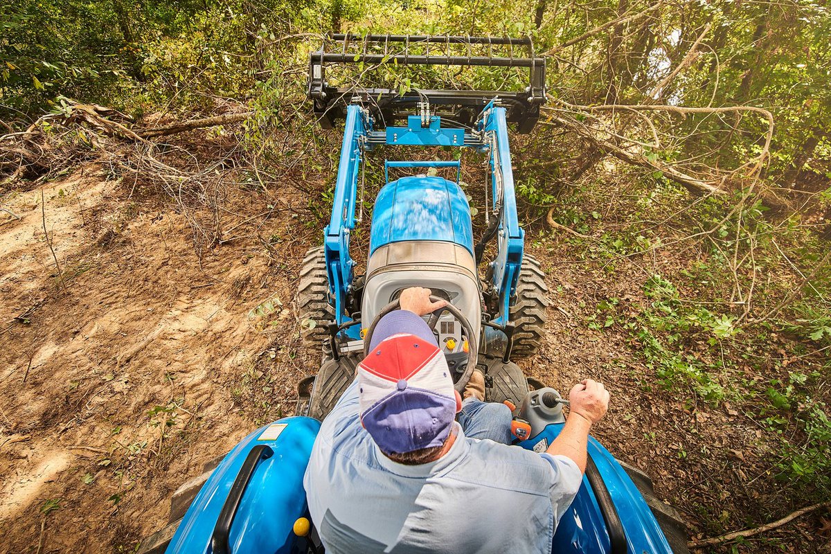 MarciaGuzon's tweet photo. Tackle tough land-clearing projects with ease from the driver’s seat of a powerful LS Tractor. Equipped with a front loader and heavy-duty grapple, it quickly clears overgrown brush and fallen limbs. Visit us at 1304 N Brooks St, Brazoria, TX 77422. https://t.co/yth59C5pVH
