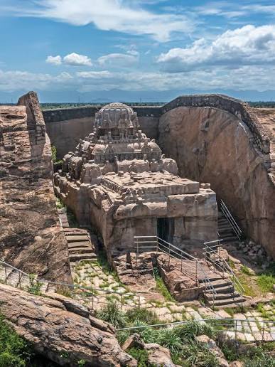 thekaipullai's tweet photo. This is the image of Vettuvan Koil, located in the village called Kalugumalai in Thoothukudi (Tuticorin) district in TN. 

This was built in 800 CE by the Pandyan king Parantaka Nedunjadaiyan. 

And this might have been one the of few temples or monuments in history, which was the output of an Architectural Dance-off between two powerful empires. 

You see in 800CE, the Early Pandyans were neighbours of the most powerful empire in India at that time, the Rashtrakutas. 

I guess some bilateral summit or a G-20 type of gathering might have happened in that time, which bought the kings of Pandyan and Rashtrakutas together. 

Now the Rashtrakutas, would have wanted to show off their architectural wonder called the Kailasa temple, the rock cut temple that was carved out of a single hill. 

I guess Nedunjadaiyan. saw it and told to his aides, "I have to get one of these", then went back and started the construction of the Vettuvan koil in Kalugumalai. 

Unfortunately, due to shifting priorities, change of Kings in 815 CE and other factors, the construction of Vettuvan koil was never completed, and it stays incomplete till this date. 

But it is fascinating to know, 1250 years ago in India, apart from battles and wars of conquest, there was an temple build-off, between two great empires, in two locations, 1500 Kms away from each other