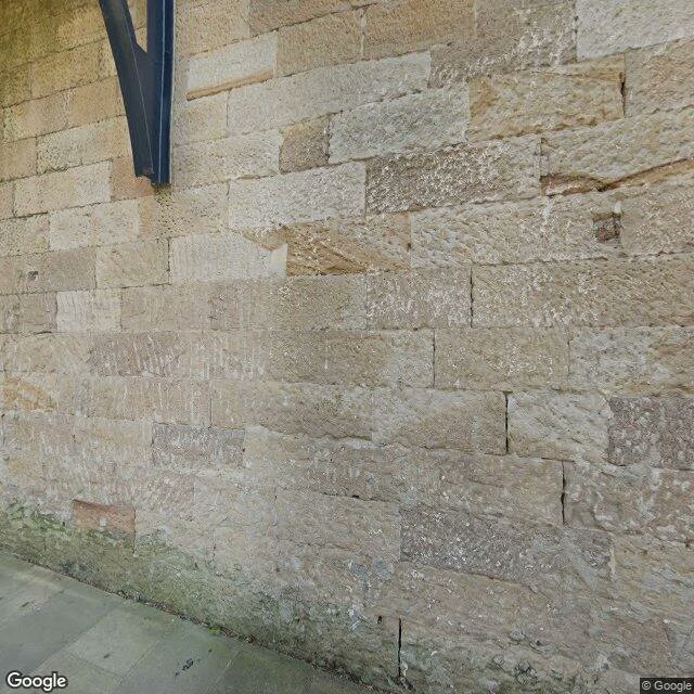 KOCKnights1's tweet photo. Street note no. 5 — beside Cadman's Cottage, The Rocks, Sydney. Sandstone under a dark iron bracket. A tan flat by the water. Stone steps where two people climb past a thin palm. One point, four directions, nothing added. Full note: https://t.co/tVurWDM9pS https://t.co/6muK2jkU9H