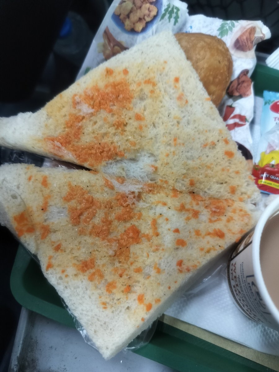 harish_dce's tweet photo. @RailMadad Travelling in 12030, PNR 2463425305, C-13, Berth 15 &amp; 16. Just look at the food quality. From what angle its looking like veg sandwich. Pathetic food quality. The vendor is big cheater. Register my complaint immediately and refund me food amount. https://t.co/T3aSFT9ul1