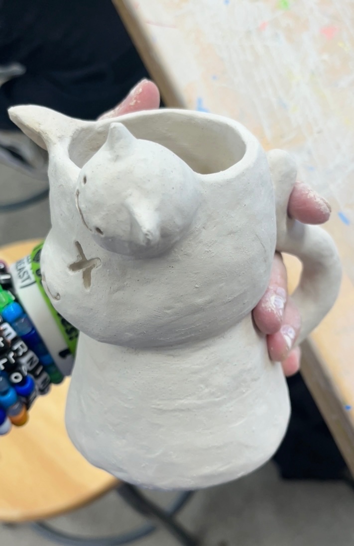 JROG_03's tweet photo. she still had not been baked yet but yesterday i added some more stuff to her aand i got a  pictures . the logo on the bottom was done from memory so it might be wrong, sorry https://t.co/CI27Bju2jb