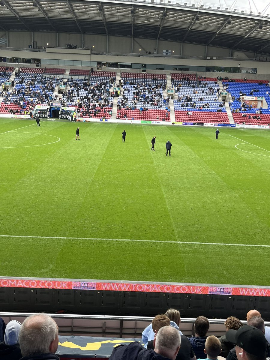 ticsmon's tweet photo. Wigan subs warming  up #cunts https://t.co/1ppWuF69dJ