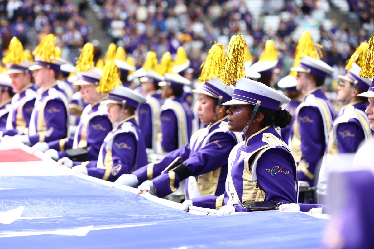 UW's tweet photo. The Husky Marching Band has new threads for 2026 — here's a look back at some of their iconic uniforms, starting with this year's new look https://t.co/H8tdCQPzgu